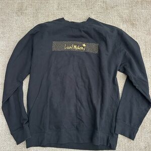 Casual Black Crewneck Sweater with Gold Detail